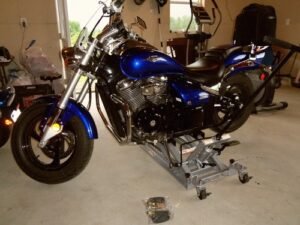 OTC 1545 Ultra Low Profile Motorcycle & ATV Lift – 1,500 lb (680 kg) Capacity, 3.5" Min Height, 17" Skids, Foot Pedal & Tie-Down Straps photo review